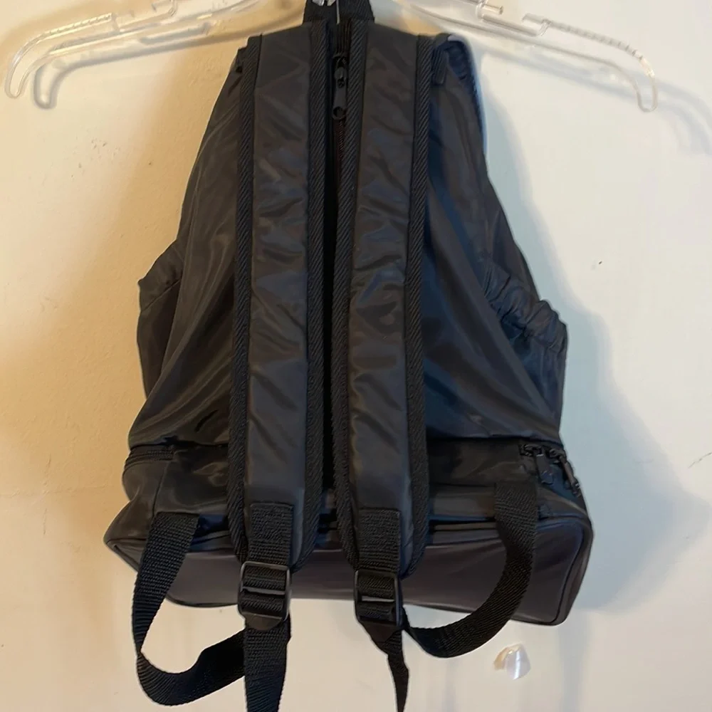 Avon go around town black baby backpack